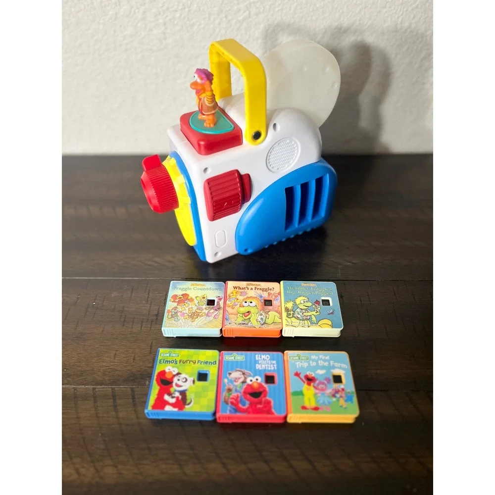 Little Tikes Story Dream Machine Projector with 6 Sesame Street & Fraggle Rock